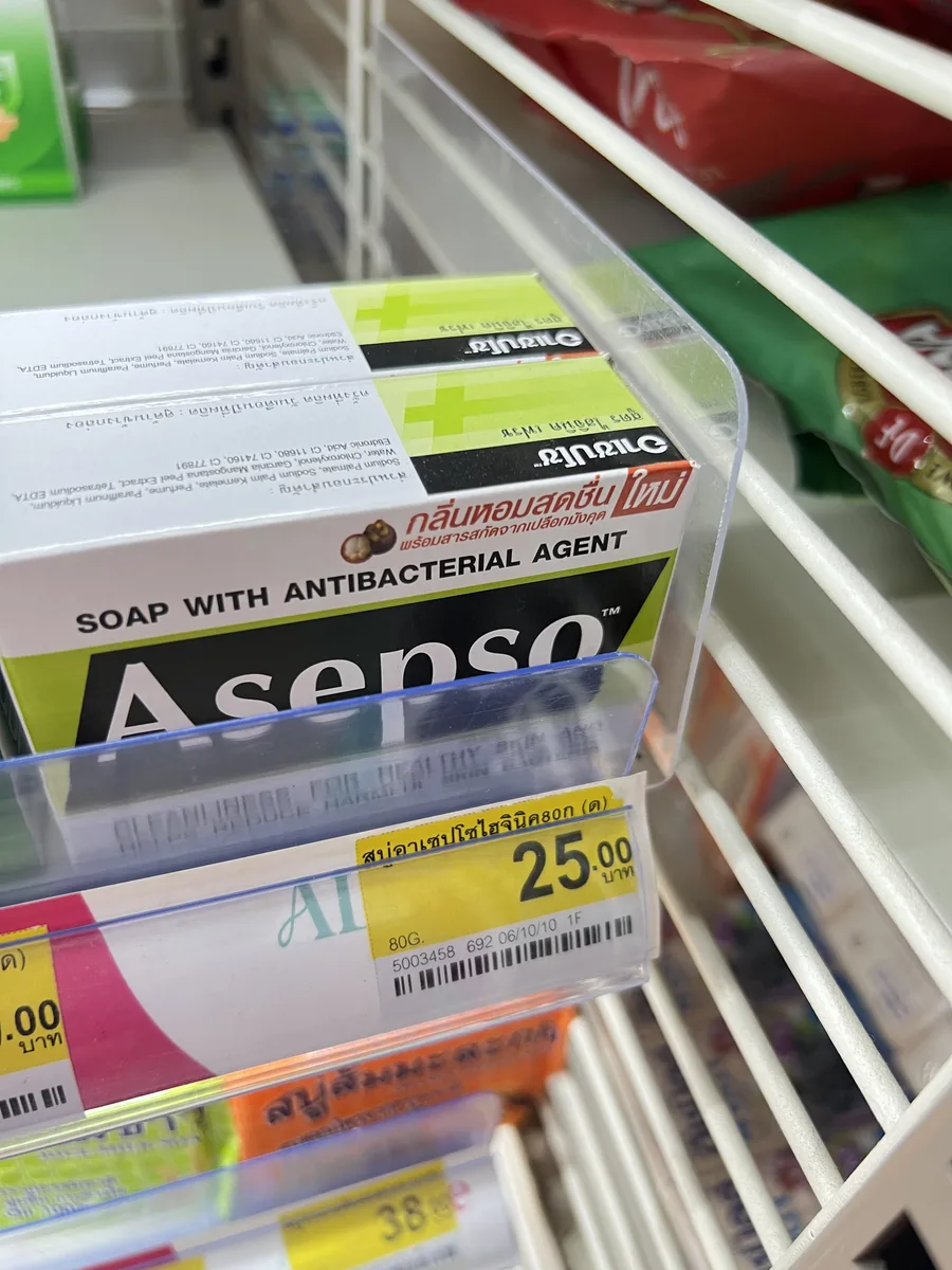 Asepso antibacterial bar soap in white and green packaging on a Phuket 7-Eleven shelf